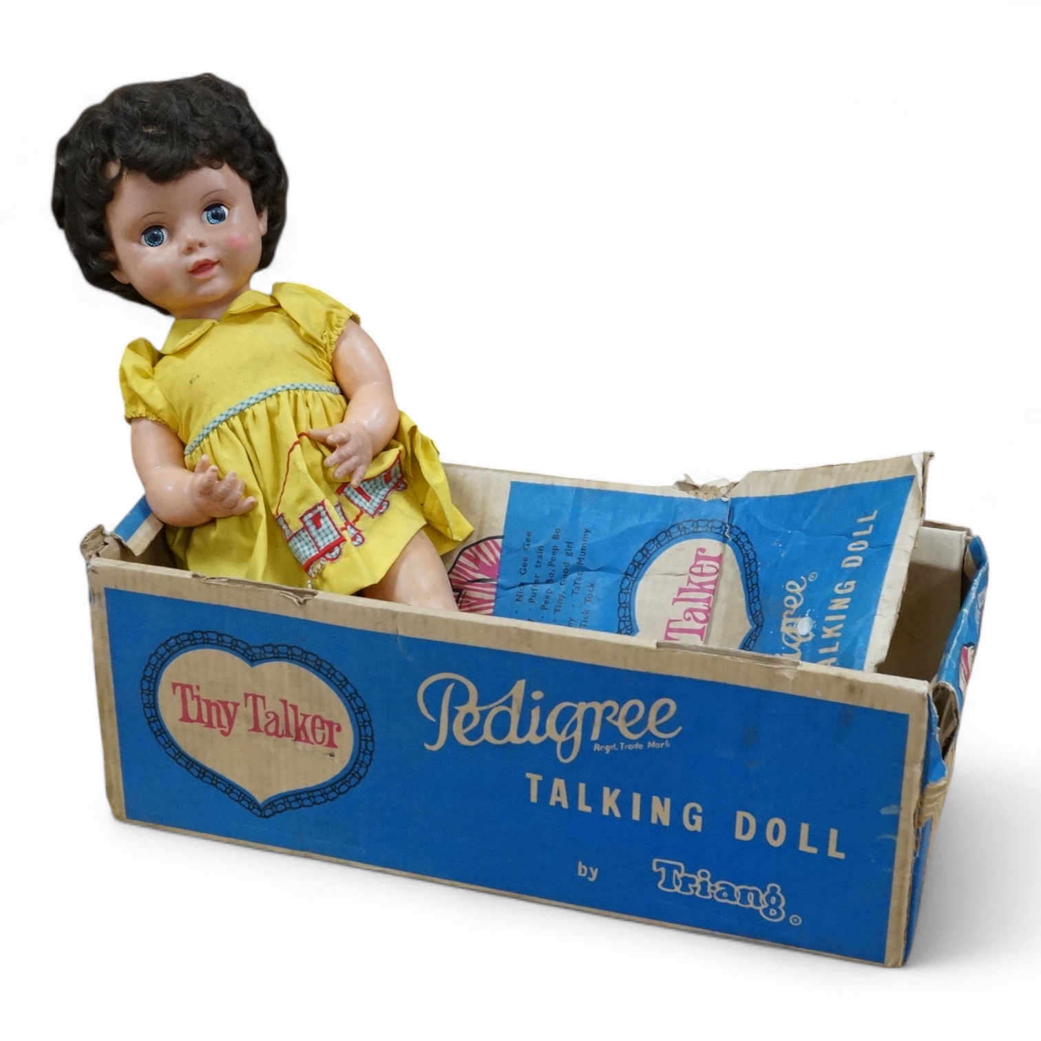 A boxed Tri-ang 'Tiny Talker' Pedigree talking doll, doll 48cm high. Condition - poor to fair, some wear to doll and damage to the box.